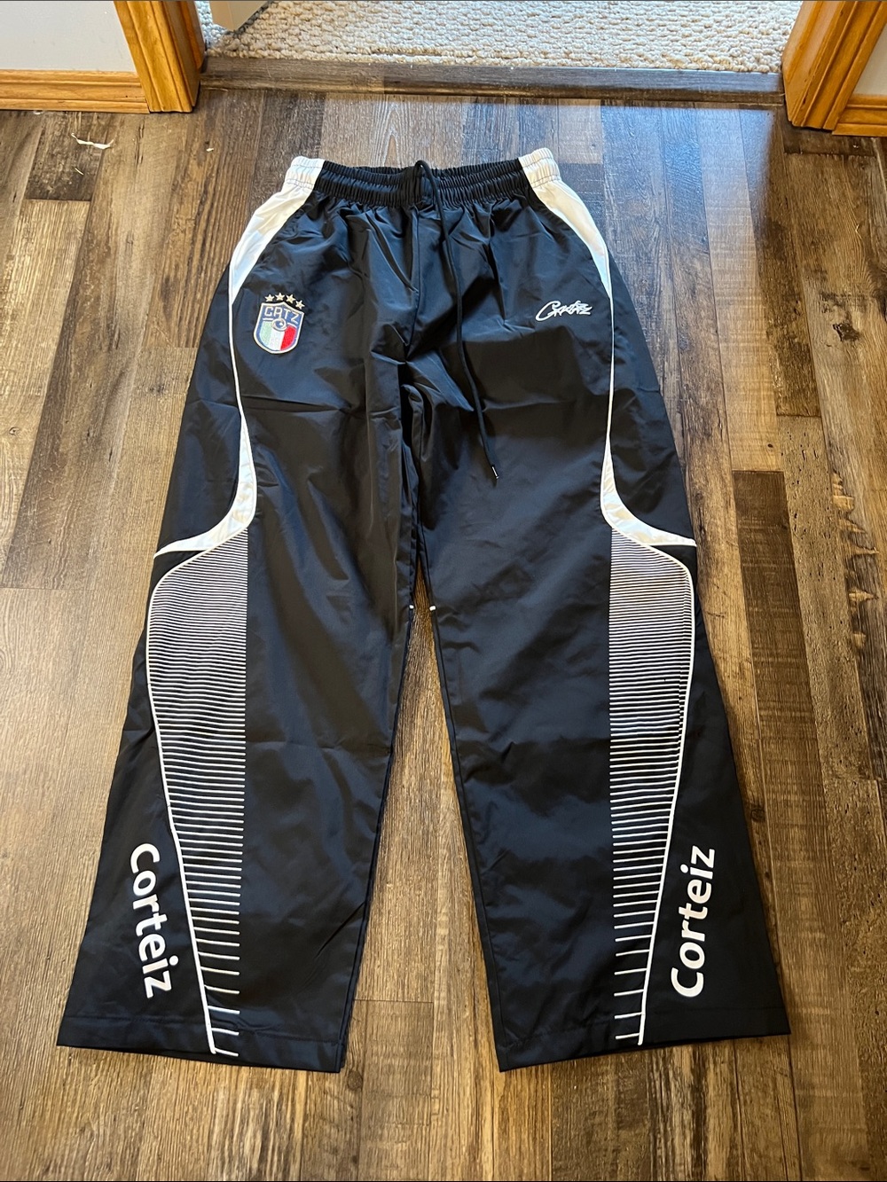 Corteiz Men’s Black Athletic Joggers with White Trim